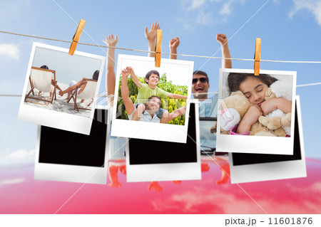 Composite image of instant photos hanging on a line 11601876