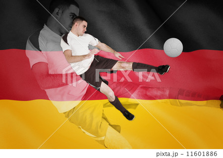 Composite image of fit football player playing and kicking Composite image of fit football player playing and kicking 11601886