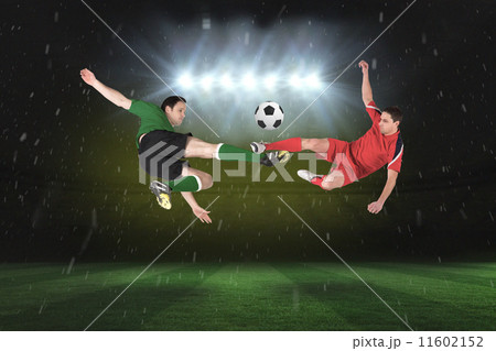 Composite image of football players tackling for the ball Composite image of football players tackling for the ball 11602152
