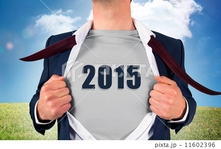 Composite image of businessman opening shirt in superhero style 11602396