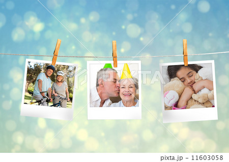 Composite image of instant photos hanging on a line Composite image of instant photos hanging on a line 11603058
