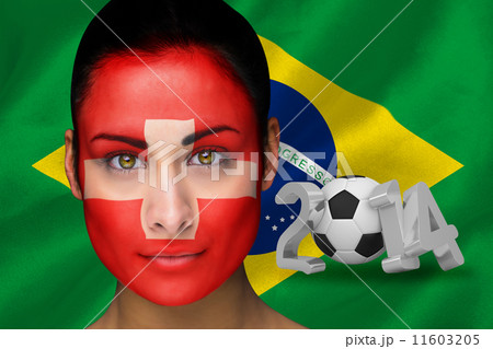 Composite image of swiss football fan in face paint 11603205