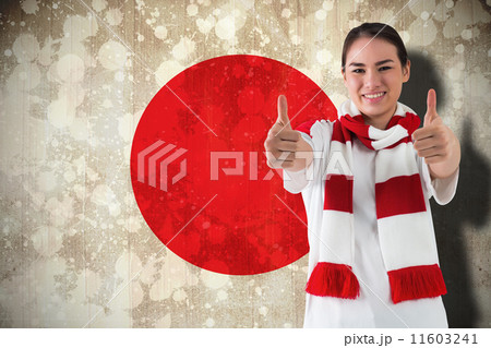Composite image of football fan in white wearing scarf showing t Composite image of football fan in white wearing scarf showing t 11603241