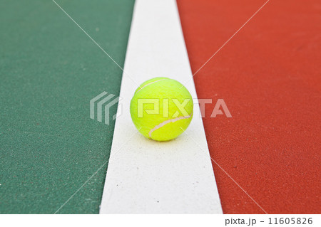 Tennis court at base line with ball Tennis court at base line with ball 11605826