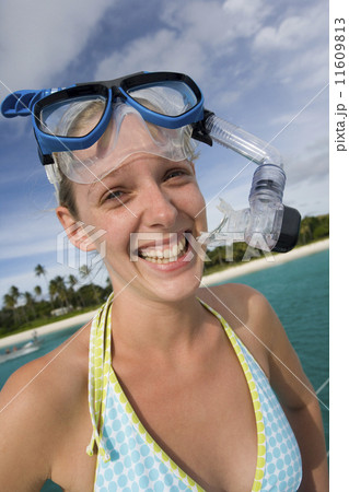 Girl in snorkel gear near a tropical beach in Fiji Girl in snorkel gear near a tropical beach in Fiji 11609813