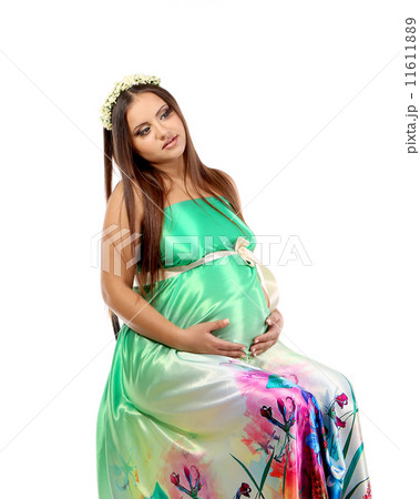 Pretty young pregnant woman. Pretty young pregnant woman. 11611889