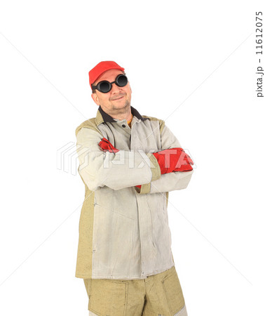 Smiling welder in glasses crosses arms. Smiling welder in glasses crosses arms. 11612075