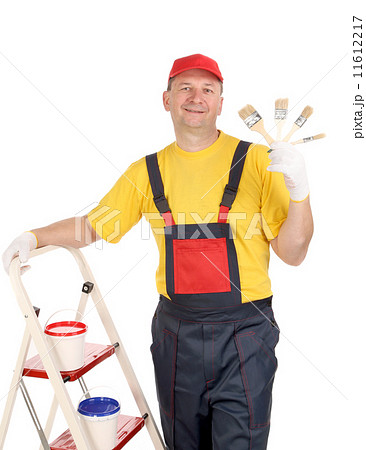 Worker on ladder with brushes Worker on ladder with brushes 11612217