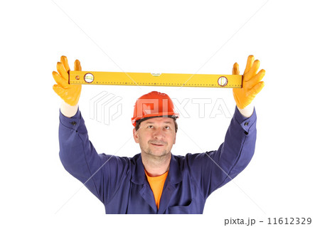 Worker in hardhat with measure ruler. Worker in hardhat with measure ruler. 11612329