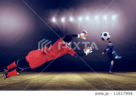 Composite image of fit goal keeper jumping up 11617908