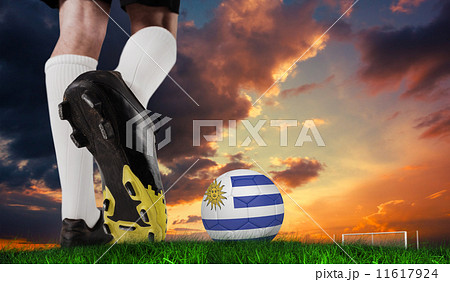 Composite image of football boot kicking uruguay ball Composite image of football boot kicking uruguay ball 11617924