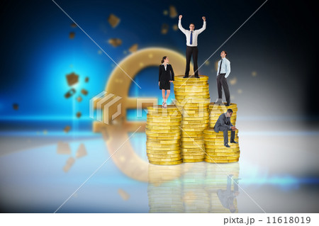 Composite image of business people on pile of coins 11618019