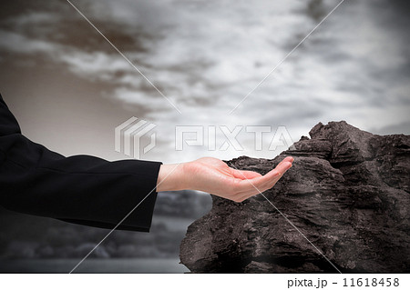 Composite image of businesswomans hand presenting 11618458