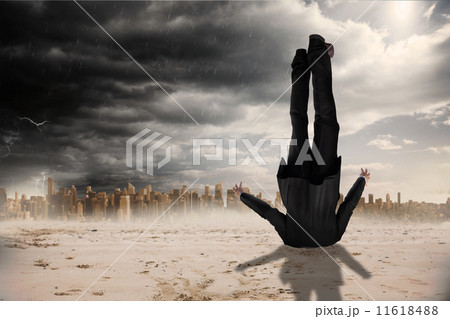 Composite image of businessman burying his head 11618488