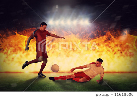 Composite image of football players tackling for the ball Composite image of football players tackling for the ball 11618606