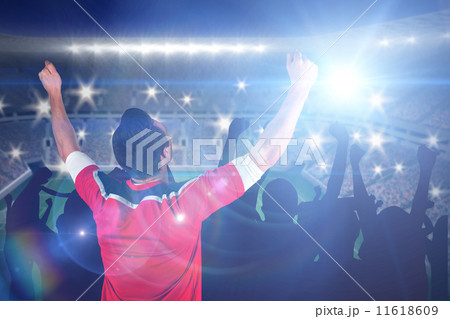 Composite image of excited football fan cheering Composite image of excited football fan cheering 11618609