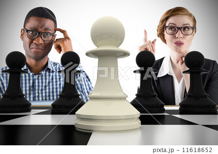 Composite image of business people playing chess 11618652
