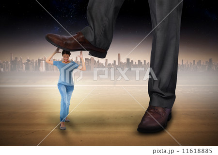 Composite image of businessman stepping on girl 11618885