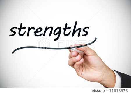 Businessman writing the word strengths 11618978