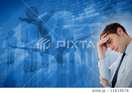 Composite image of businessman with a headache 11619078
