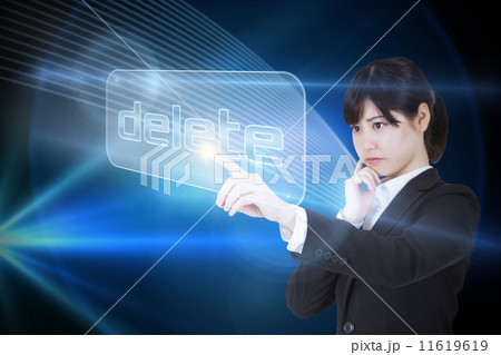 Businesswoman pointing to word delete Businesswoman pointing to word delete 11619619