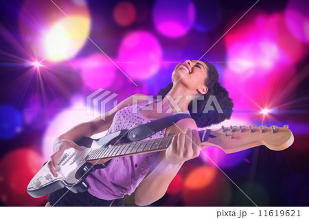 Composite image of pretty girl playing guitar Composite image of pretty girl playing guitar 11619621