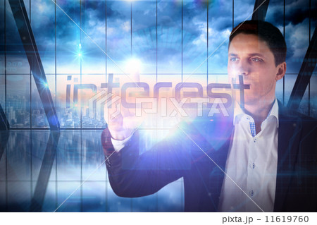 Businessman presenting the word interest 11619760