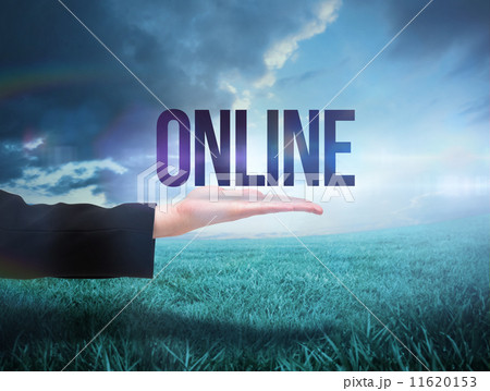 Businesswomans hand presenting the word online 11620153