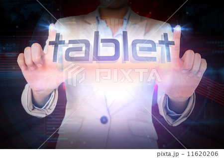 Businesswoman presenting the word tablet Businesswoman presenting the word tablet 11620206