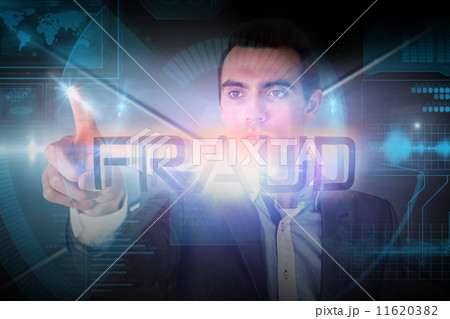 Businessman presenting the word fraud 11620382