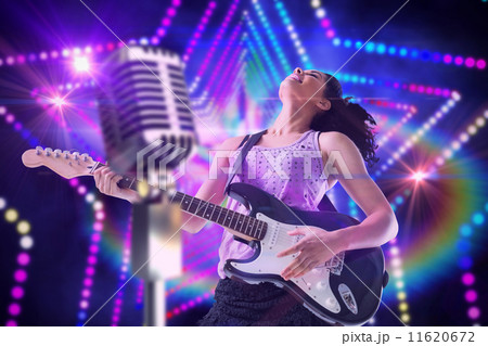Composite image of pretty girl playing guitar Composite image of pretty girl playing guitar 11620672