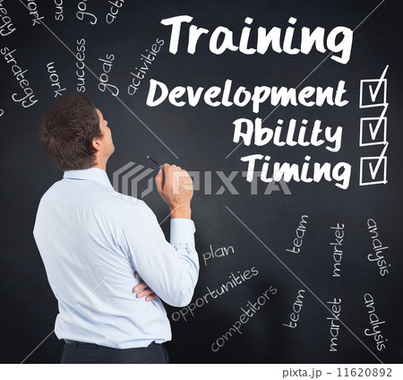 Composite image of thinking businessman holding pen Composite image of thinking businessman holding pen 11620892