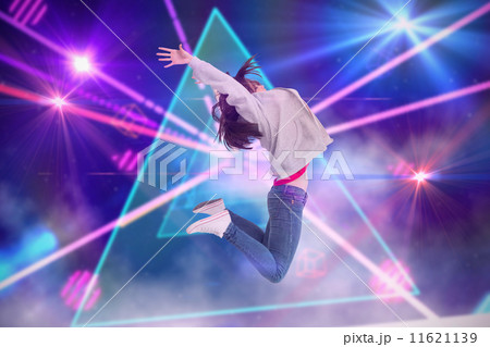 Composite image of cheerful young woman jumping 11621139