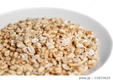roasted peanuts in a plate on white background roasted peanuts in a plate on white background 11625629