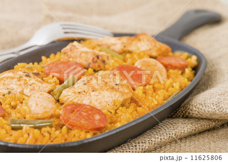 Paella Valenciana - Paella with chicken, sausage and vegetables  11625806
