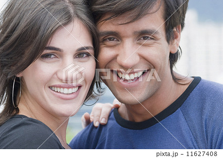 Close up of Hispanic couple smiling 11627408