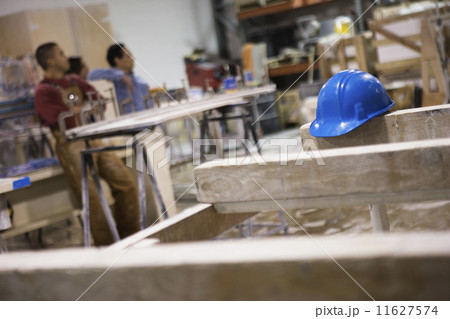 Hard hat in workshop Hard hat in workshop 11627574