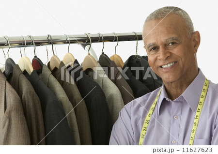 Portrait of tailor smiling 11627623