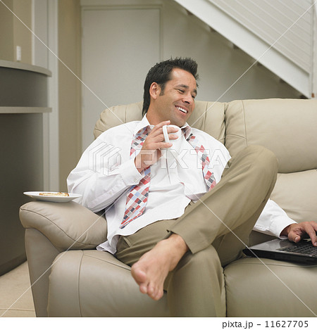 Businessman looking at laptop 11627705