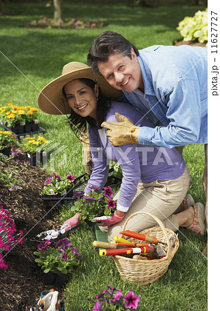 Hispanic couple gardening 11627727