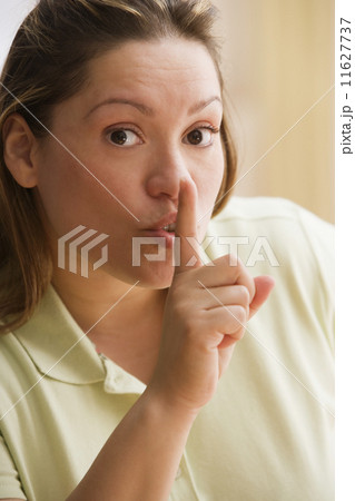 Young woman going "shh"  11627737