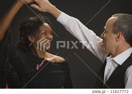 Multi-ethnic couple dancing 11627772