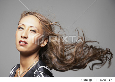 Native American woman with hair blowing 11628137