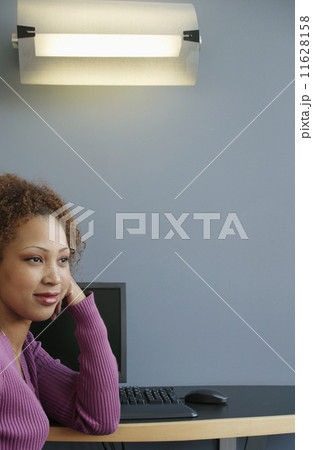 Businesswoman at desk 11628158