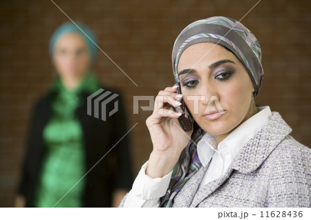 Middle Eastern businesswoman talking on cell phone 11628436