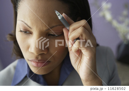 African businesswoman thinking 11628502