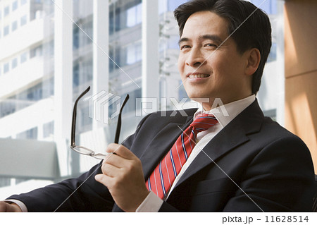 Confident Chinese businessman 11628514