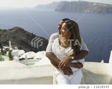 African American couple hugging 11628545