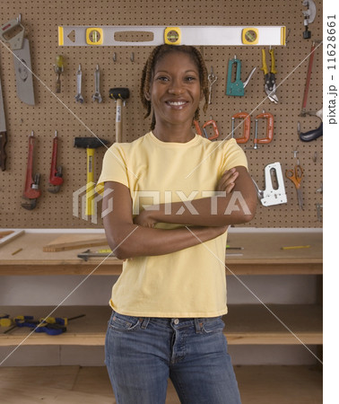 African American woman in woodworking shop 11628661