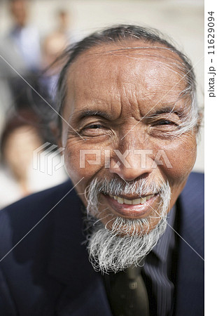 Close up of senior Asian man with beard 11629094